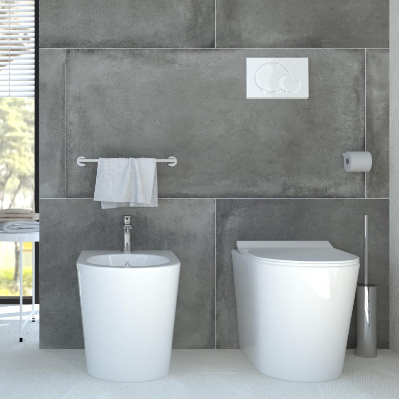 Nettuno - Sanitari a terra filo parete in ceramica bianca tondi wc rimless  sedile soft-close